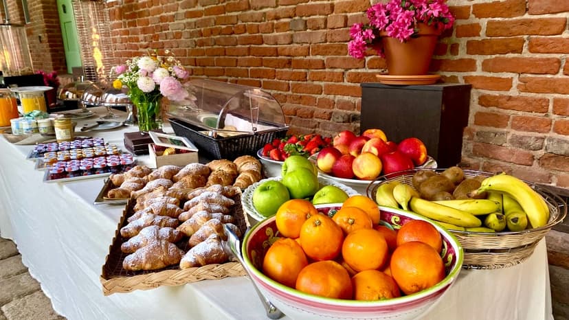 Convivial lunch in the villa courtyard