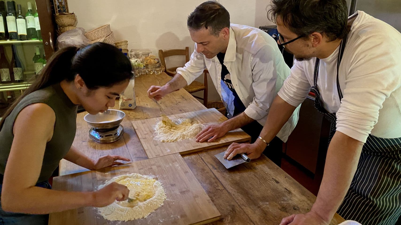 Guests hand-rolling fresh pasta at Tenuta Castel Venezze